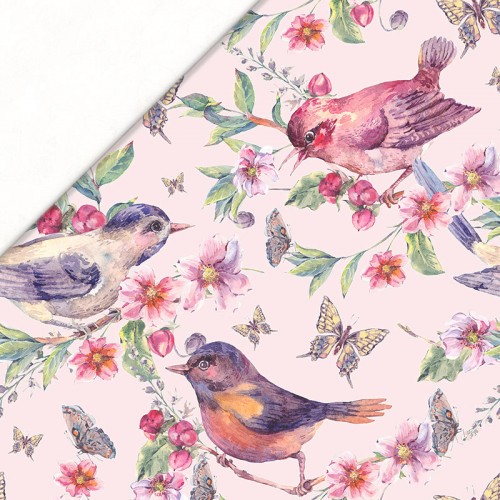 Ptaki na kwitnących gałęziach na różowym tle