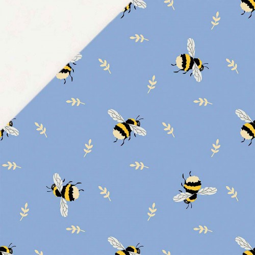 Pszczoły na niebieski tle