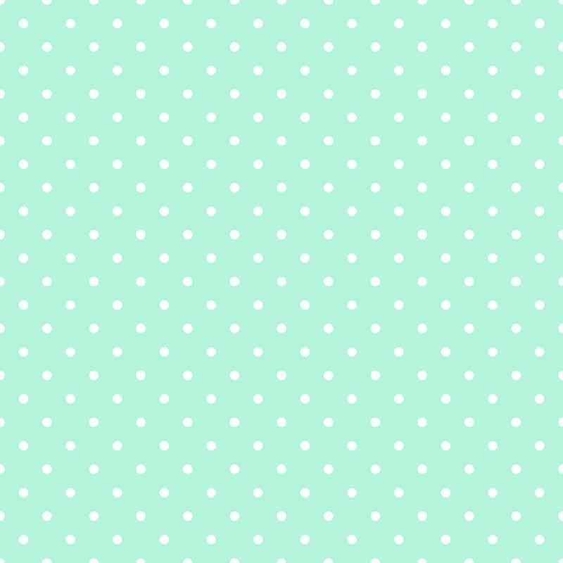 Białe groszki na turkusowym tle