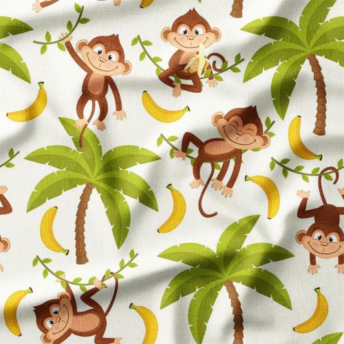 Małpki z bananami bawiące się na drzewach